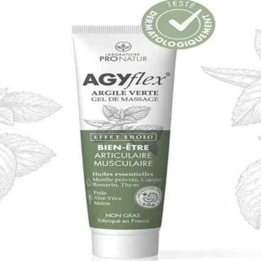 Tube de gel de massage AGYflex à l’argile verte, bien-être articulaire Alazina, fond feuille.